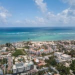 los corales drone aerial photo of beach and apartments